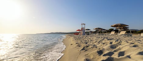 Private beach nearby, white sand, sun loungers, beach umbrellas