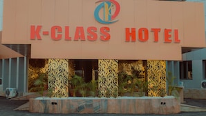 A K-Class Hotel sign with a logo above the name. - K-class Hotel (Abuja)
