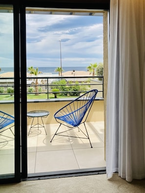 Deluxe Room, 1 King Bed, Sea View | 1 bedroom, premium bedding, in-room safe, desk