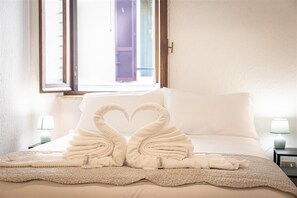 2 habitaciones, tabla de planchar con plancha, wifi y ropa de cama 