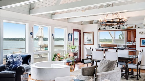 Waterfront beach house with breathtaking views, multiple outdoor areas, gas...