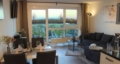 Beautiful apartment directly on the beach Living room and terrace with panoramic sea view