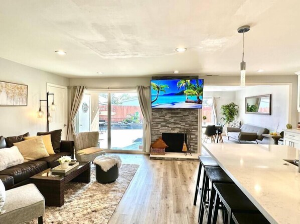 Smart TV, fireplace, books