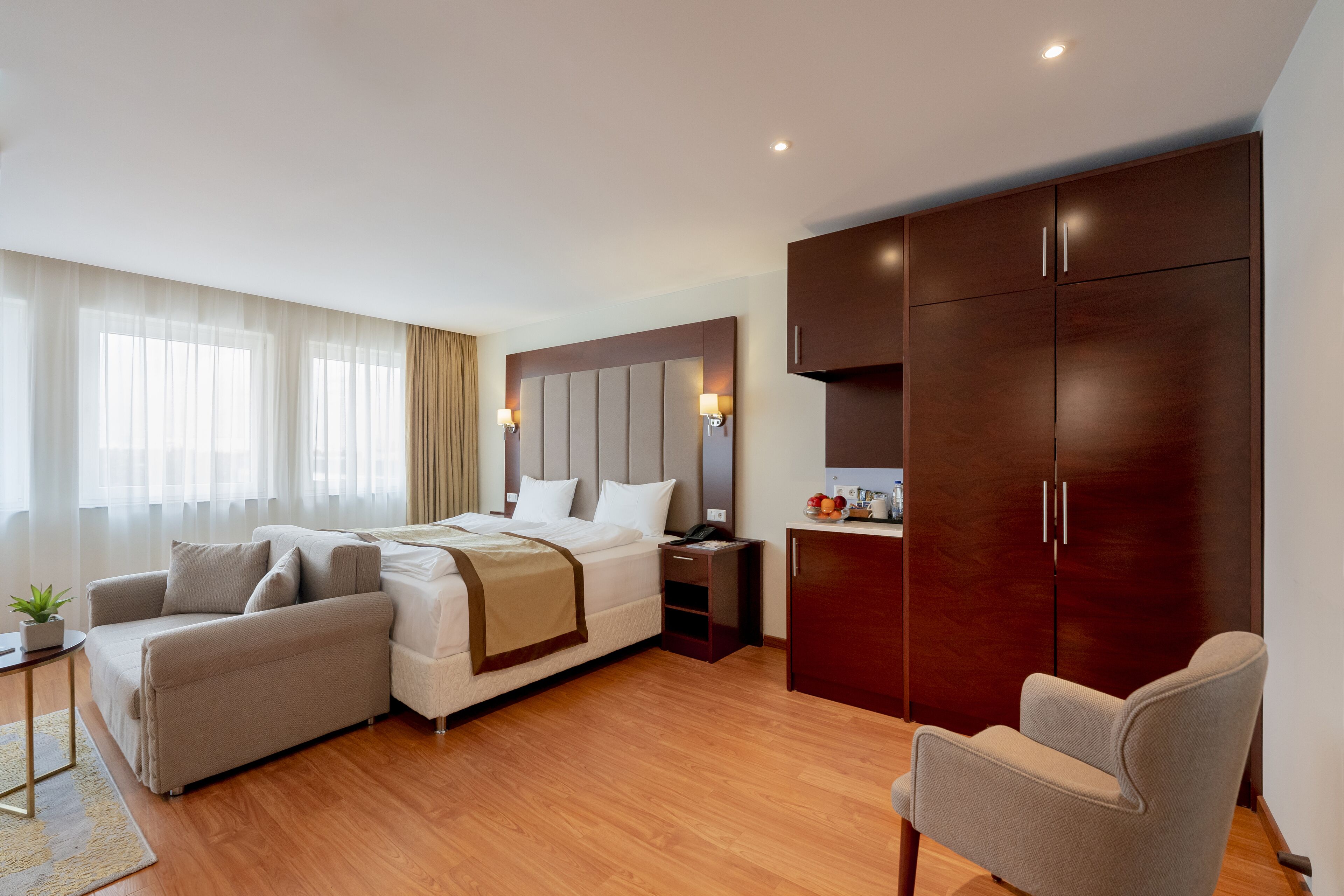 business quadruple room | select comfort beds, in-room safe, desk, laptop workspace