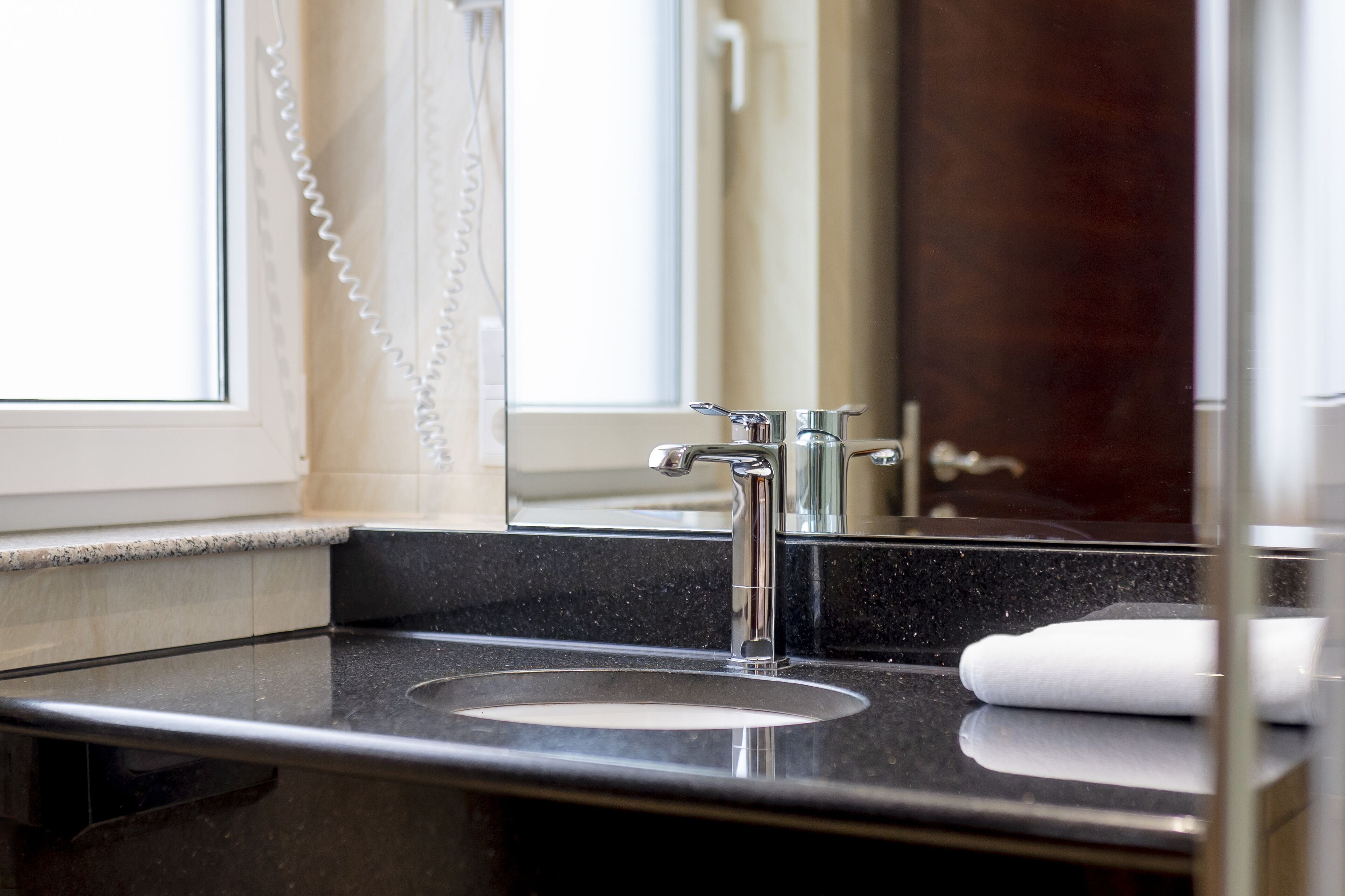 rainfall showerhead, hair dryer, towels, soap