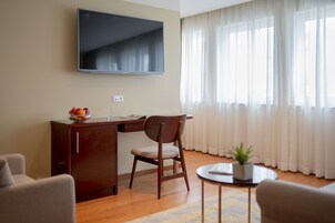 Business Quadruple Room | Select Comfort beds, in-room safe, desk, laptop workspace