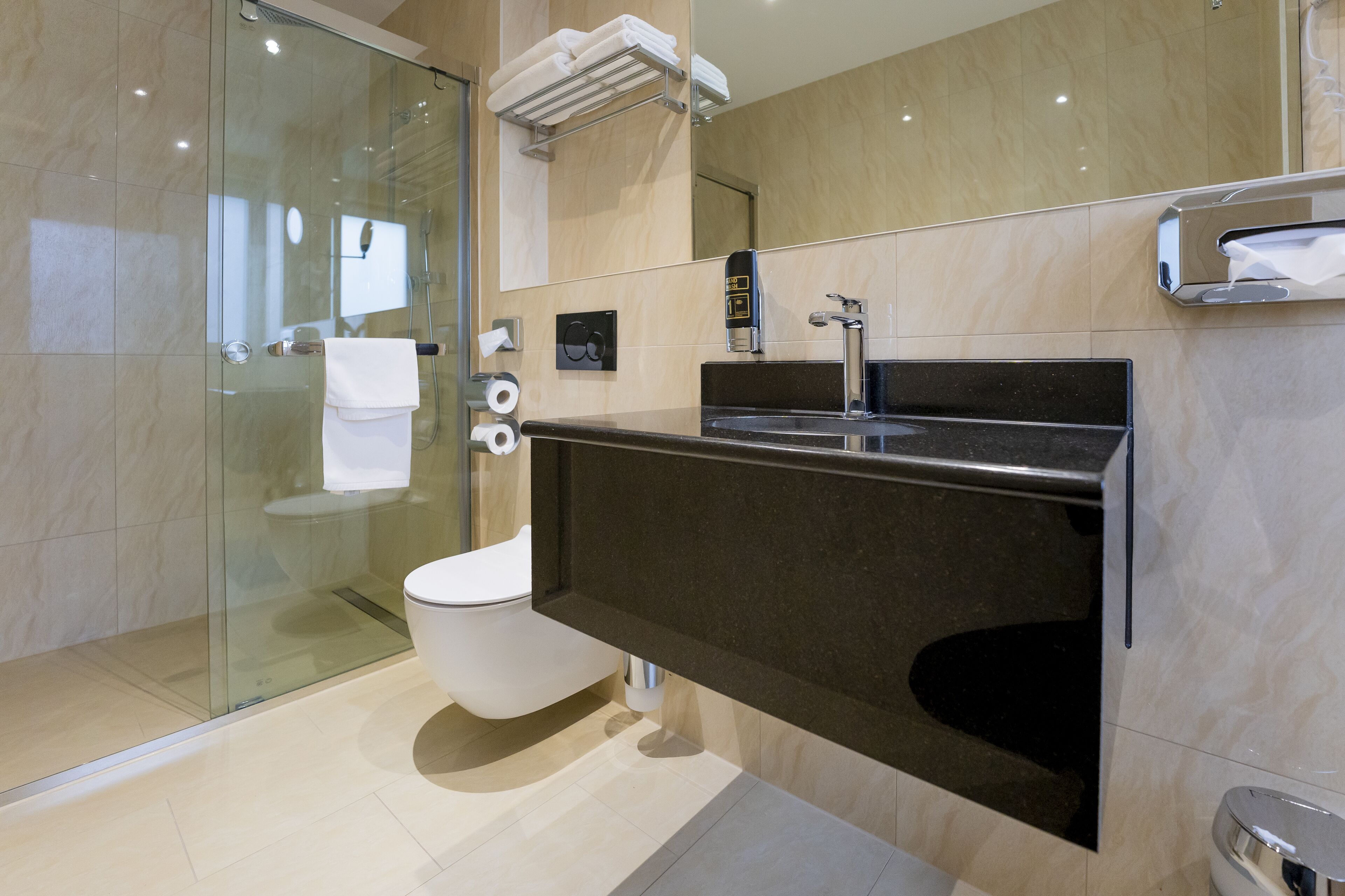 rainfall showerhead, hair dryer, towels, soap