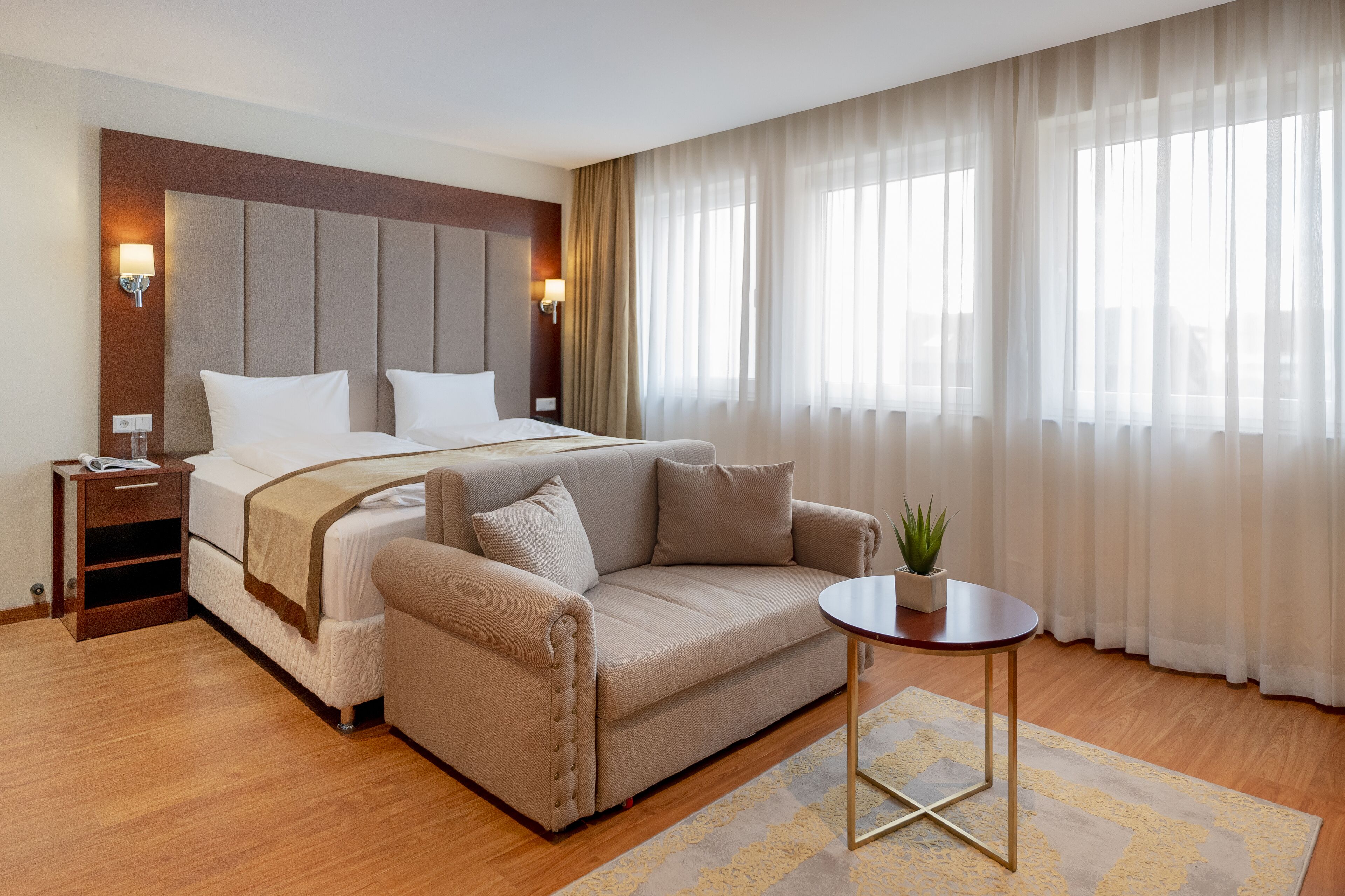luxury triple room | select comfort beds, in-room safe, desk, laptop workspace