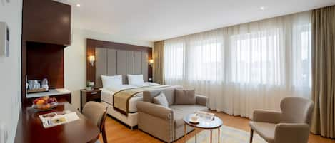 Luxury Triple Room | Select Comfort beds, in-room safe, desk, laptop workspace