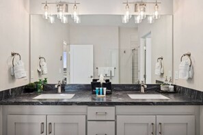 Combined shower/tub, hair dryer