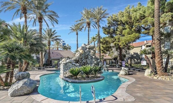 Outdoor pool, a heated pool - Vegas Resort 2-Bed Condo walking distance to Casinos (Ideal for Long Stays) (Las Vegas)