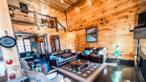 TV connectée, cheminée, jeux vidéo, livres