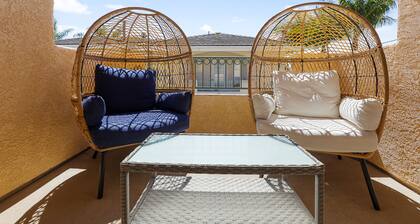 Dog-friendly home near beach with fireplace, grill, yard, & W/D