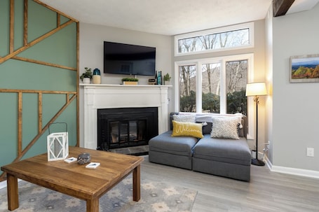 Fireplace. The Modern Mountain Condo