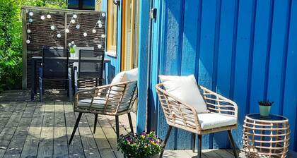 Vacation home with barrel sauna, fireplace and massage chair.