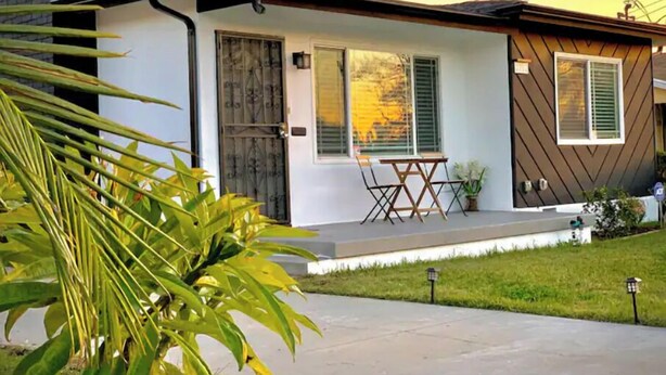 A modern single-story house with a flat roof, a front porch, and a small patio area. - Bright 2 Bedroom Cozy HOUSE! Pasadena/Alhambra Prime Location! Dogs OK! (Alhambra)
