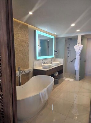 Bathtub, bidet, towels, soap