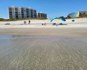 On the beach, sun loungers