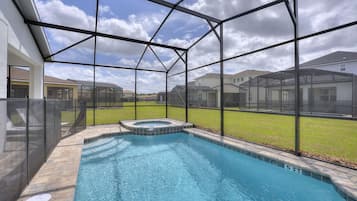 A heated pool, pool loungers