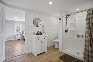 Bathtub, hair dryer, towels, soap