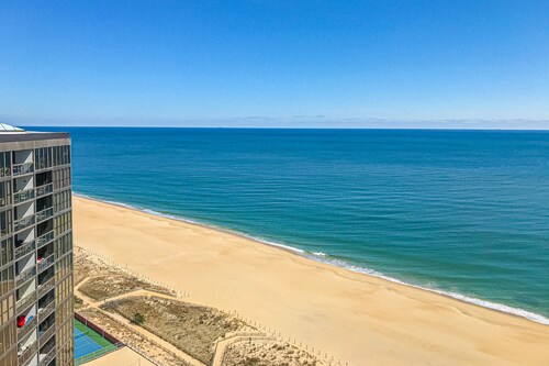 Two-story beachfront penthouse with ocean & bay views, pools & game room