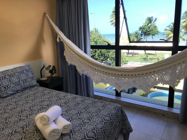 Apartamento conforto | Vista para a rua