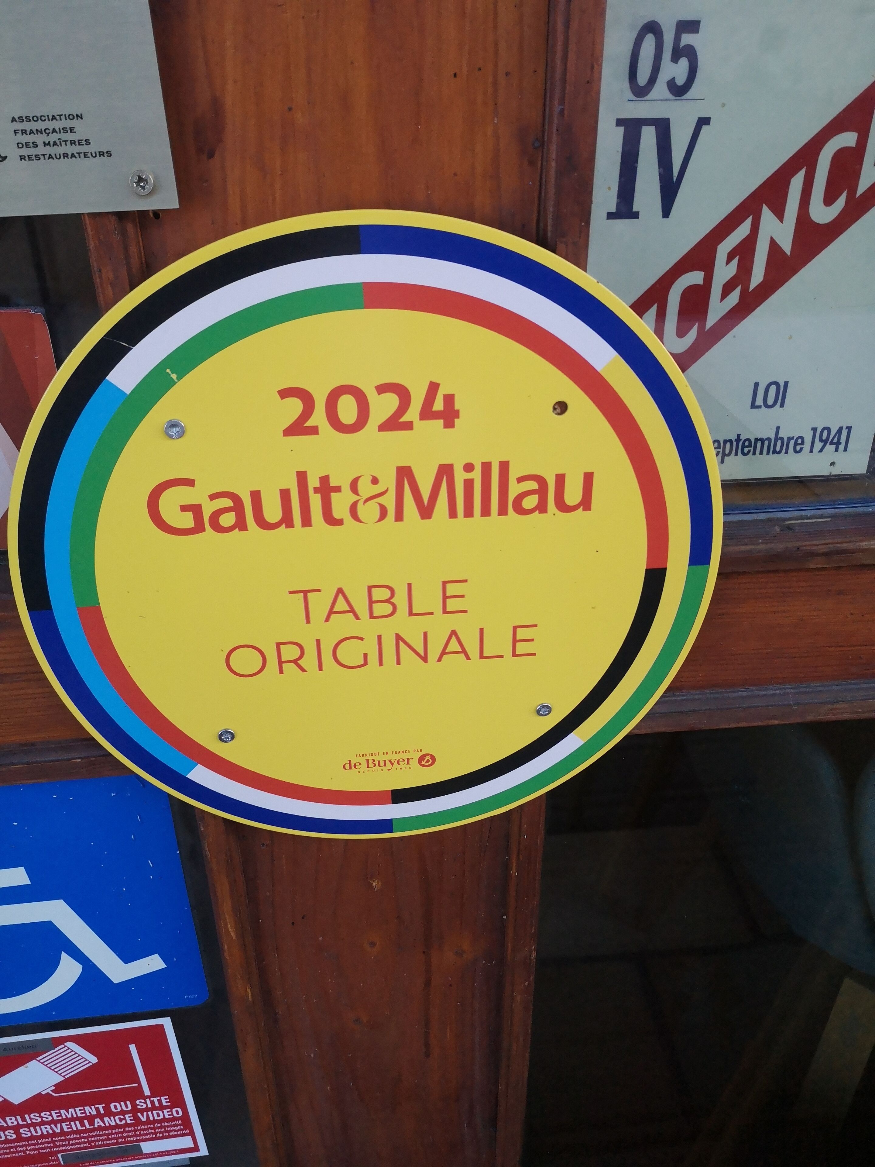 A colorful sign for the 2024 Gault & Millau Table Original.