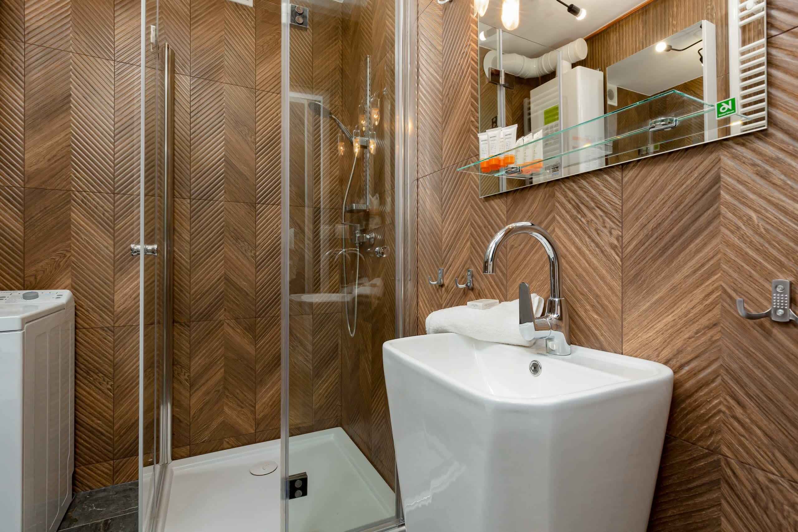 Shower, hair dryer, towels, shampoo
