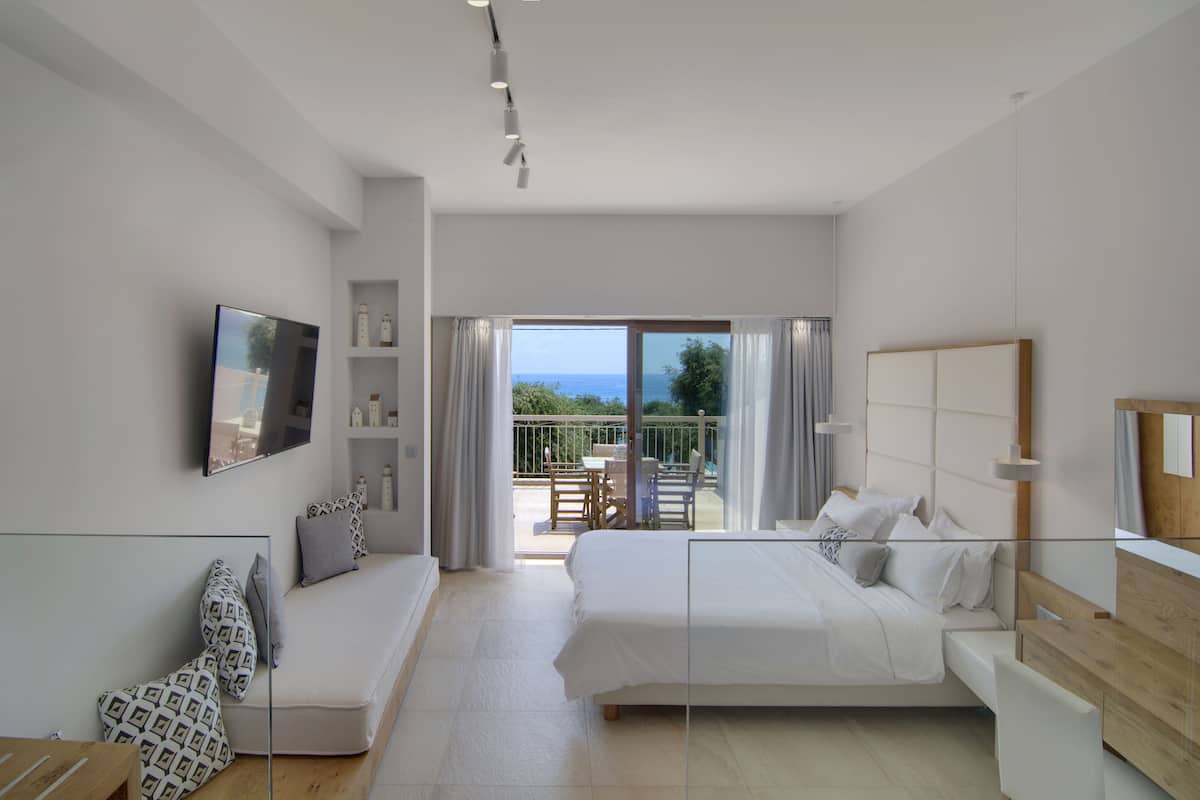 Family Junior Suite with Balcony and Sea View | 2 bedrooms, down comforters, in-room safe, individually decorated