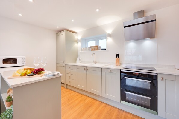 Fridge, oven, cookware/dishes/utensils
