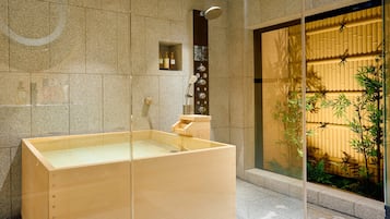 Family Penthouse | Bathroom | Combined shower/tub, deep soaking tub, hydromassage showerhead