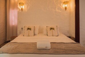 Ropa de cama de alta calidad, minibar y cortinas blackout 