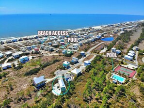 Enjoy beach access and two pools in this coastal community, offering a tennis court and shoreline views.