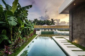 Outdoor pool - Modern 3-bedroom villa with pool between rice paddies and jungle (Ubud)