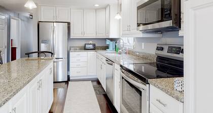 Spacious home with tree-lined yard, deck, Ping-Pong, air hockey & washer/dryer