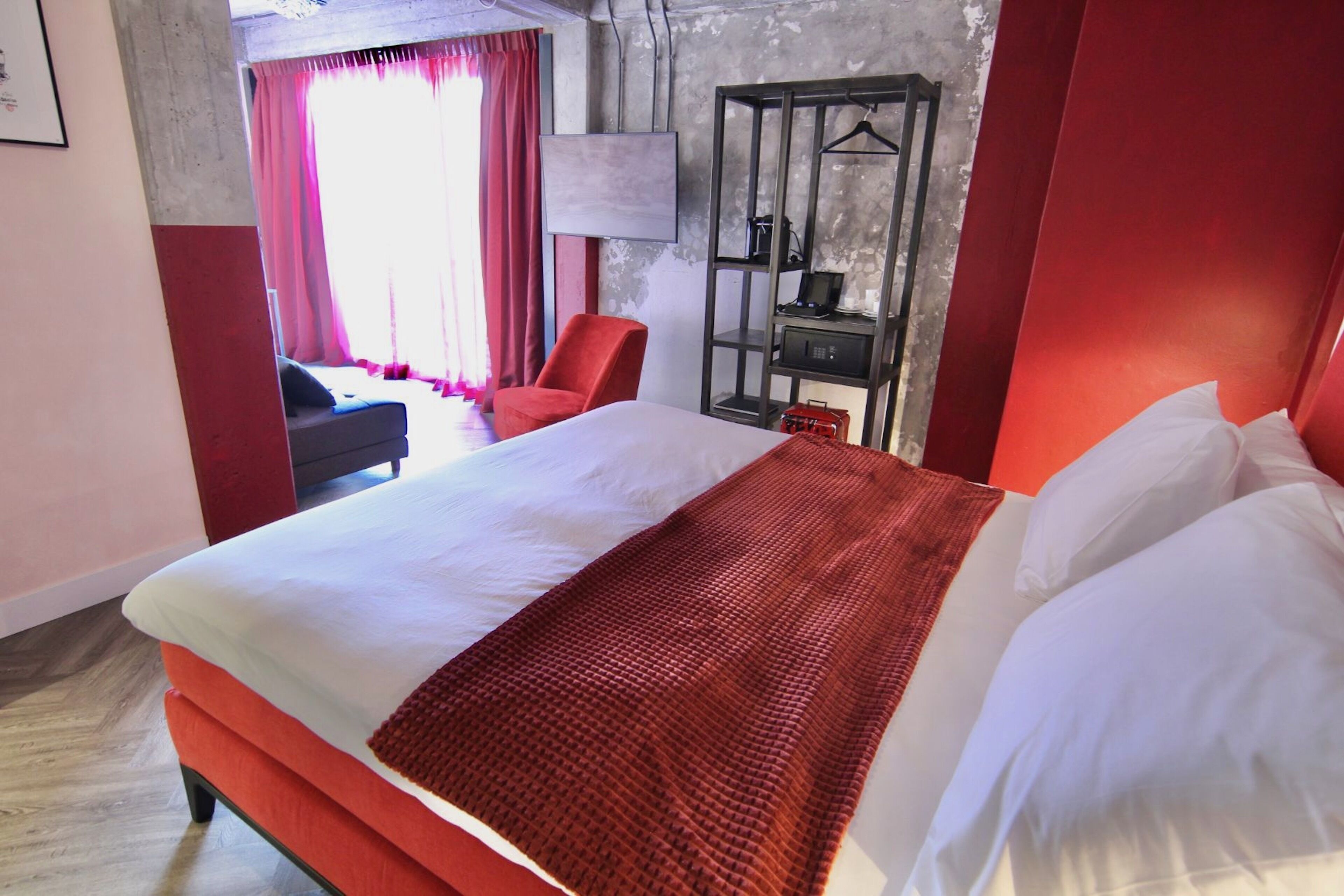 Hypo-allergenic bedding, free minibar, in-room safe