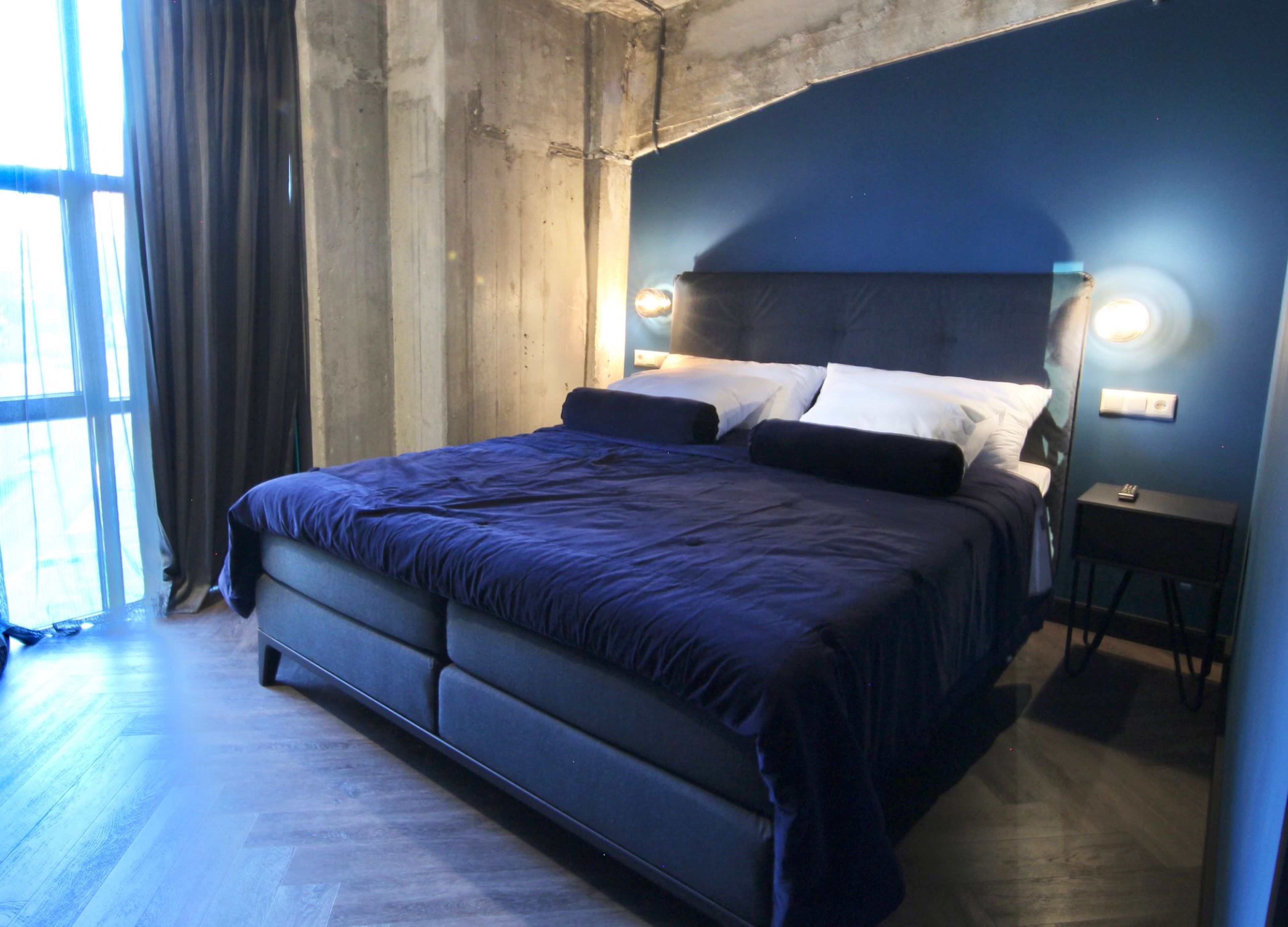 Hypo-allergenic bedding, free minibar, in-room safe