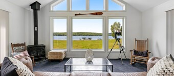 Dog-friendly lake escape with sunroom, high-speed WiFi, water views & central AC