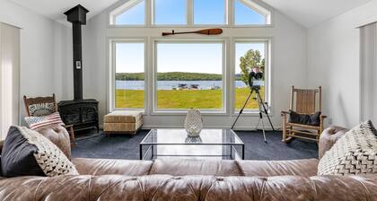 Dog-friendly lake escape with sunroom, high-speed WiFi, water views & central AC