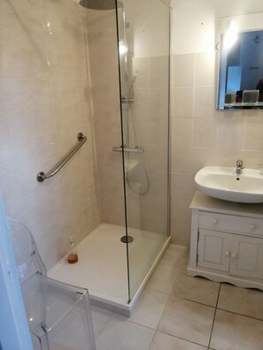 Shower, hair dryer, towels, soap