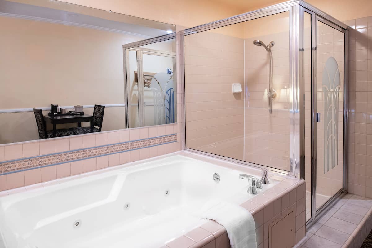 romantic room, 1 queen bed | bathroom | separate bathtub and shower, towels, soap, shampoo