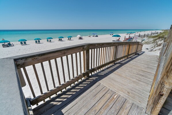 On the beach, sun loungers, beach towels