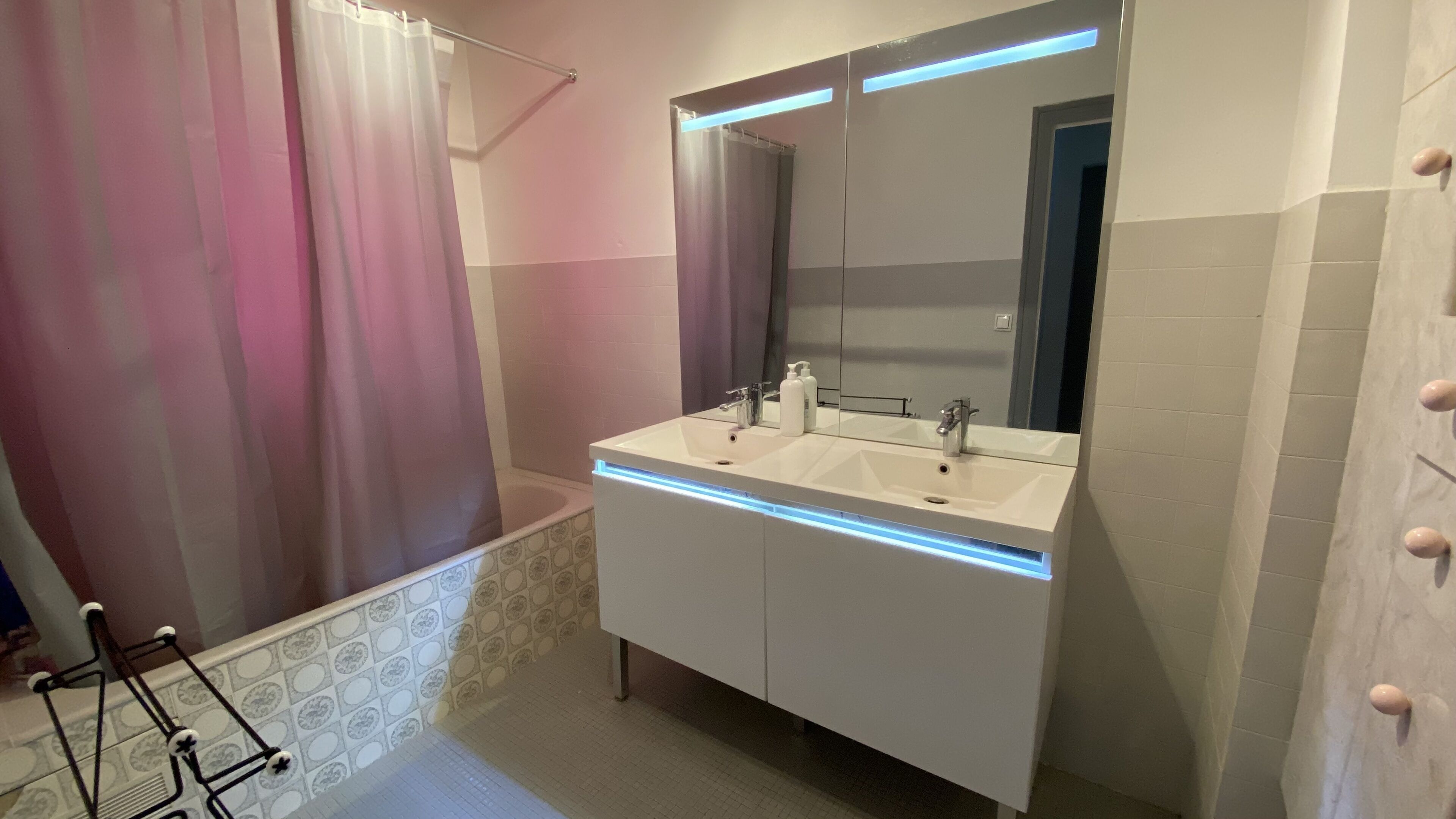 Bathtub, hair dryer, towels, soap