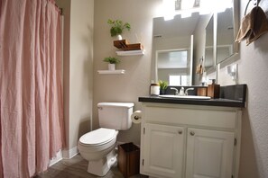 Combined shower/bathtub