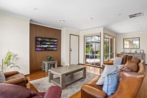 Smart TV, foosball, table tennis, books