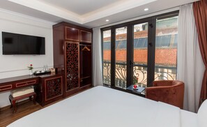 Junior Suite City View | Frigobar, Wi-Fi de cortesia, roupa de cama