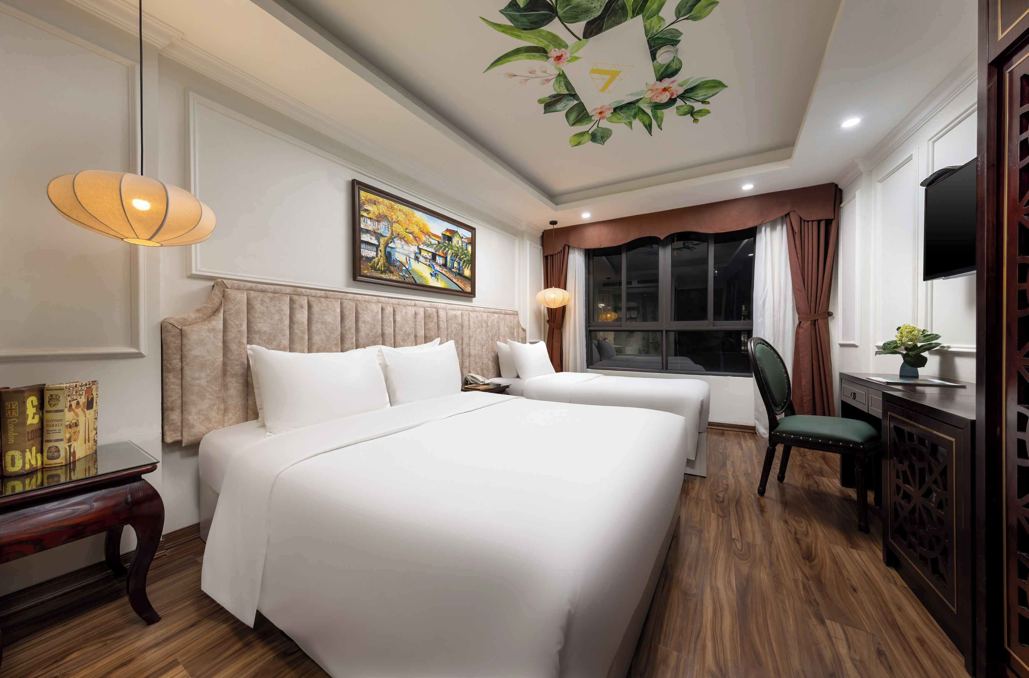 Quarto triplo executivo | Frigobar, Wi-Fi de cortesia, roupa de cama