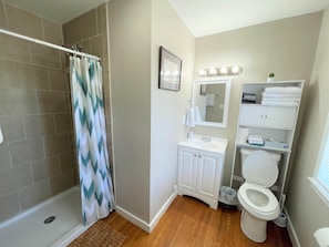 Shower, hair dryer, towels, soap