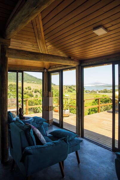 Villa Santorini Praia do Rosa with pool and jacuzzi.