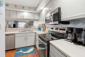 Fridge, microwave, oven, stovetop - Golf and family-friendly rental w/pool, hot tub-1 block from beach in Ocean Drive (North Myrtle Beach)